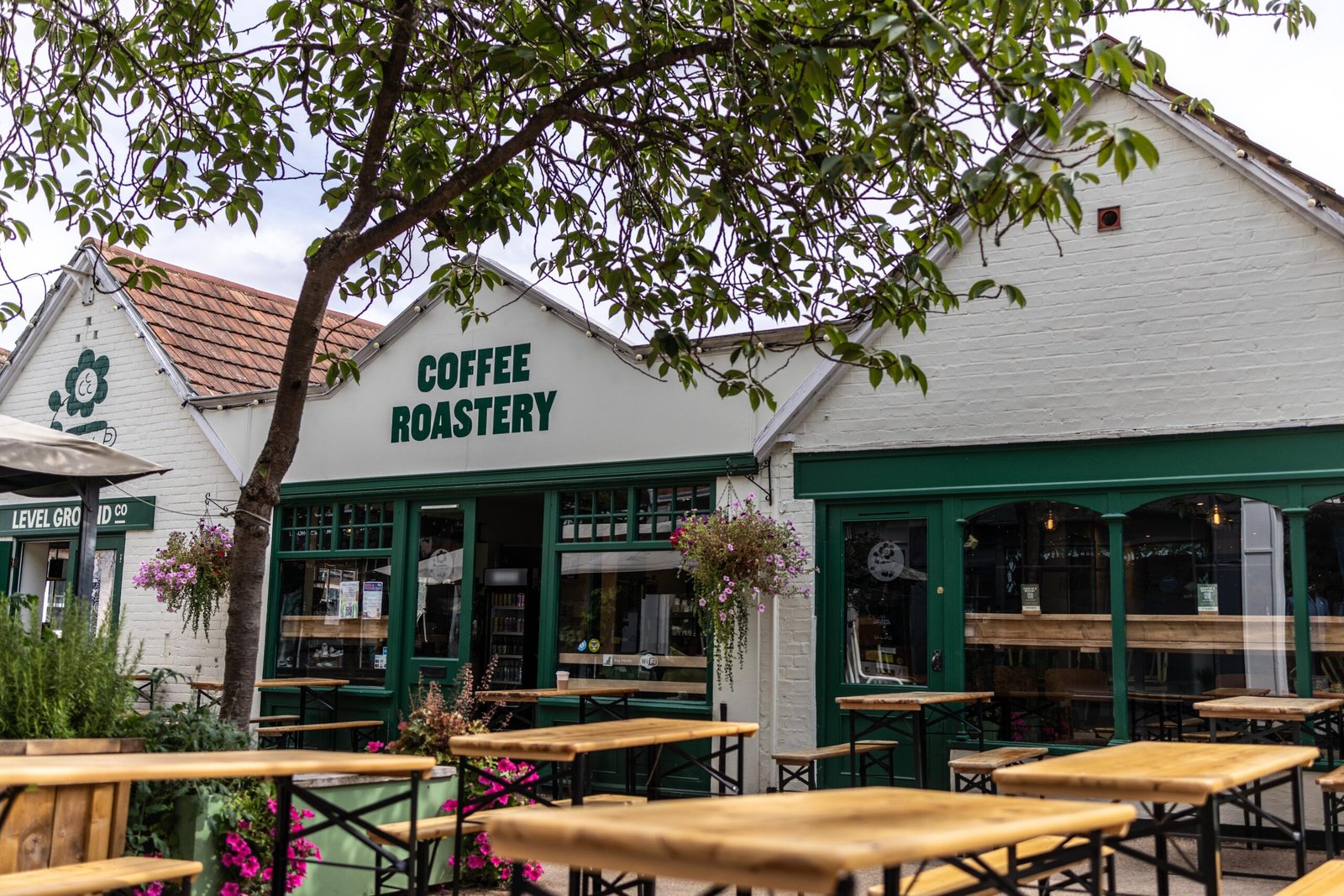 Level Ground Co coffee roastery shopfront in Letchworth Garden City, with outdoor seating