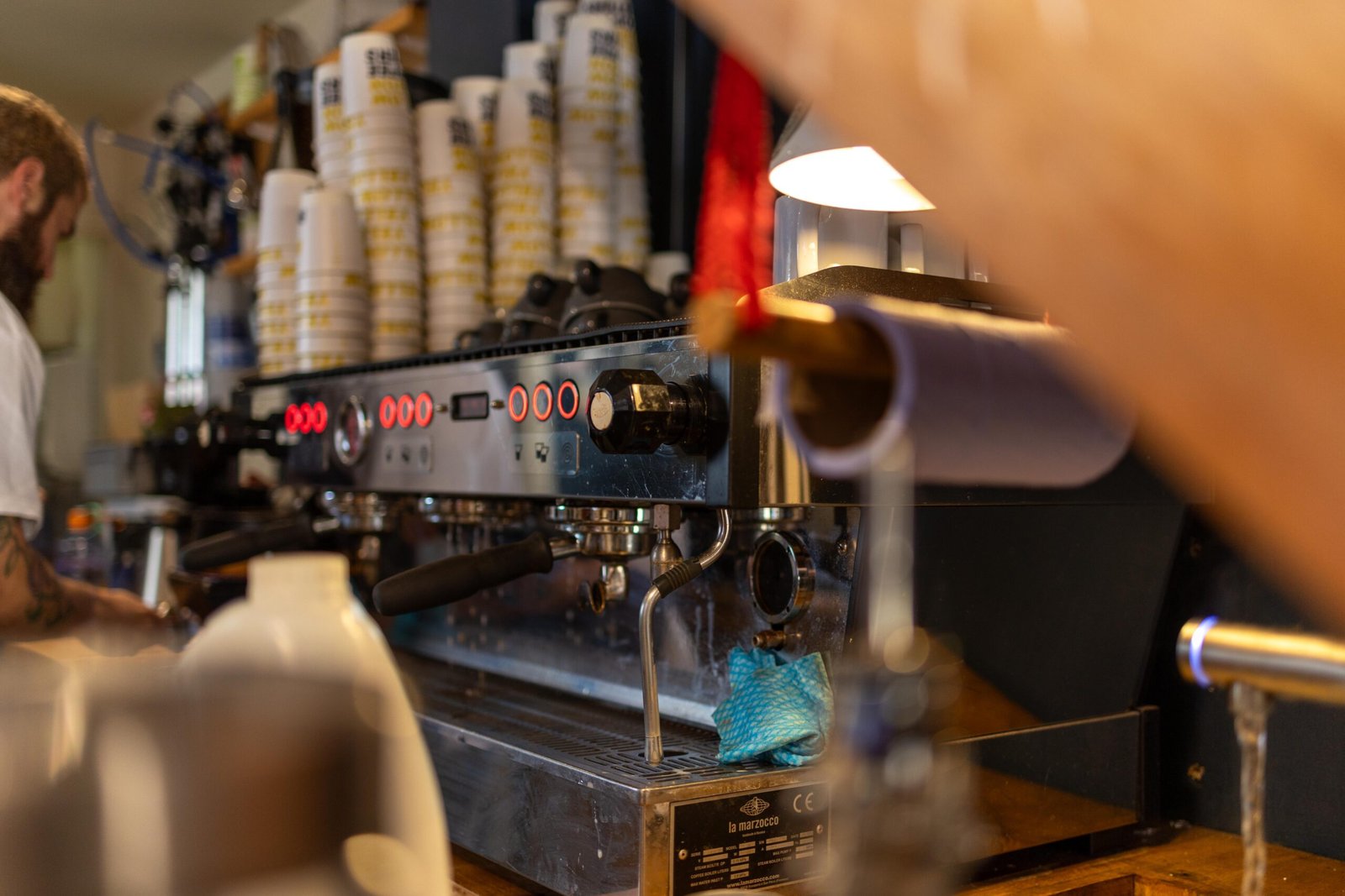 The team working the espresso machine at Yellow Bourbon on Angel Street