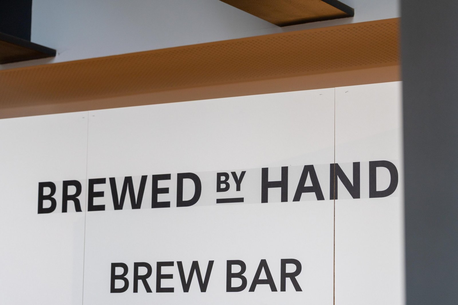 The Brewed by Hand brew bar signage at Bristol Coffee Festival