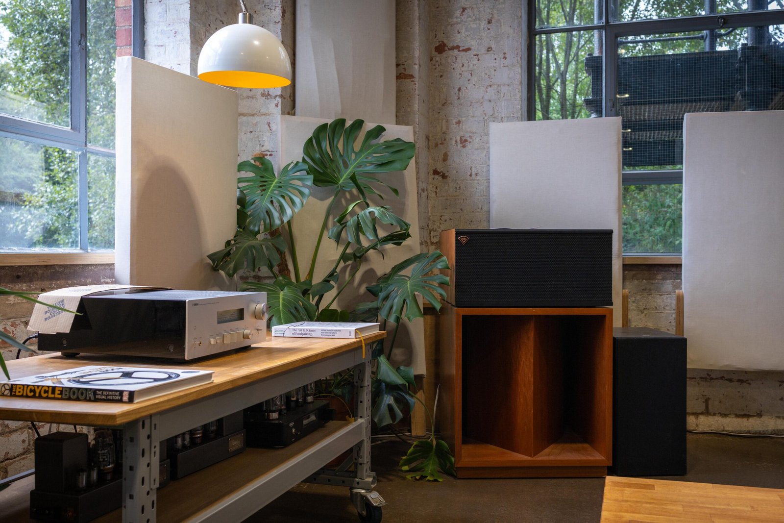 A record player and hi-fi setup by the window at Yellow Bourbon's Weedon Depot