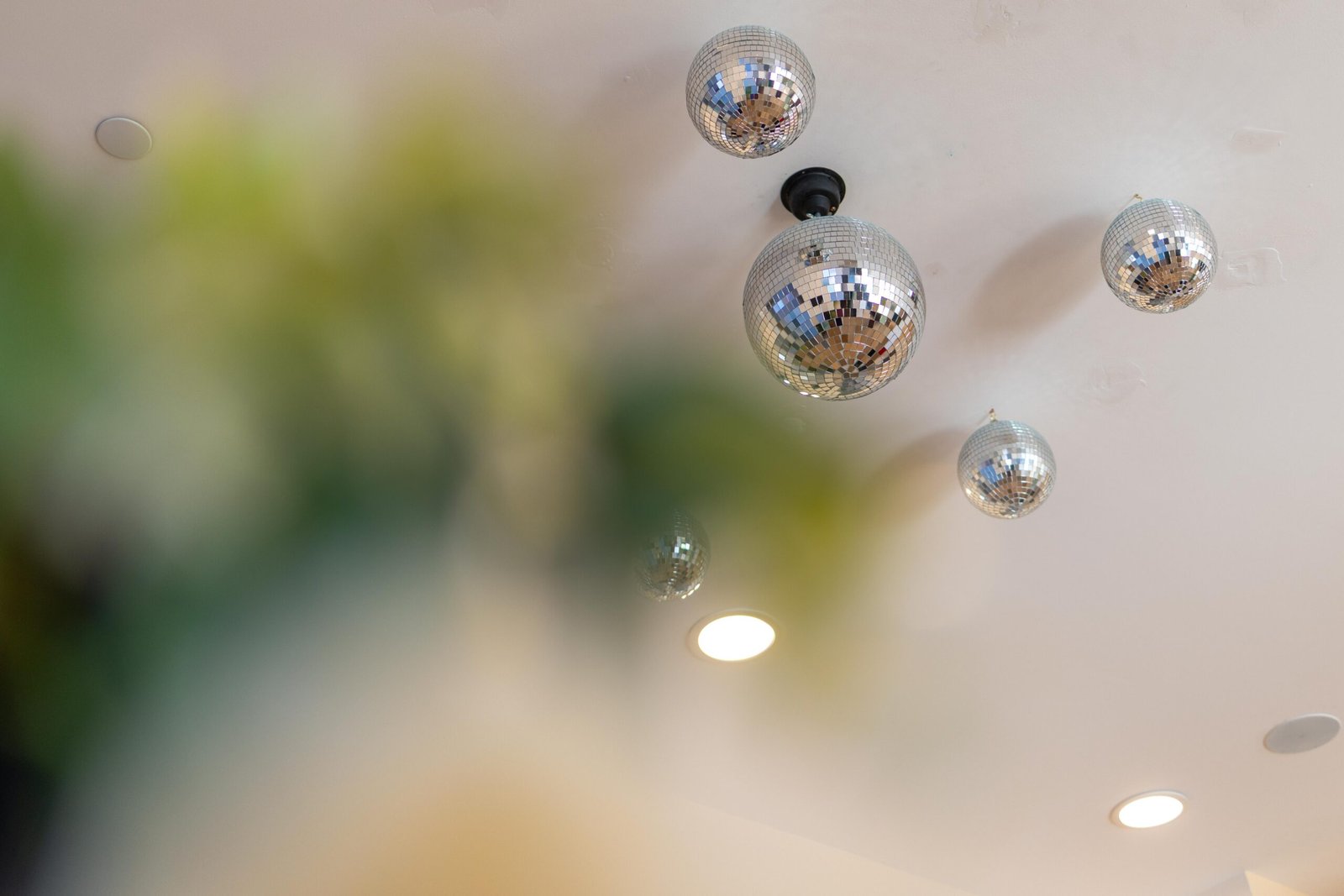 Disco balls hanging from the ceiling