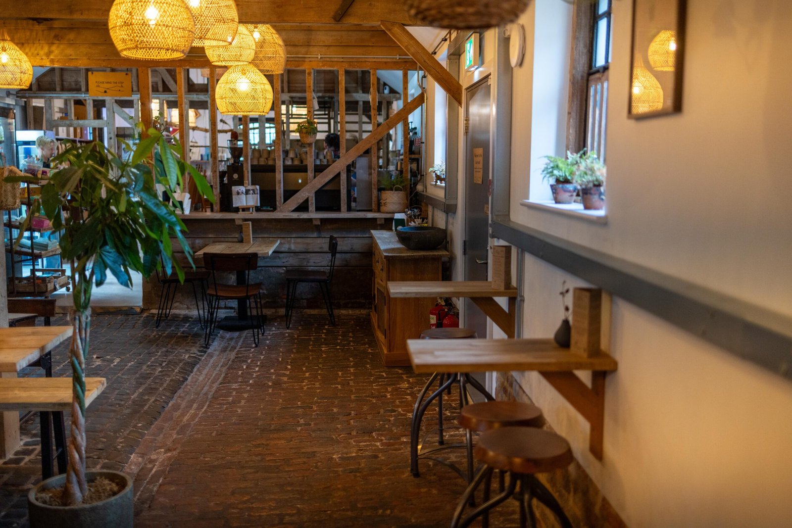 The cobbled floor and exposed timber framing inside Wooden Hill's bigger shop at Haynes