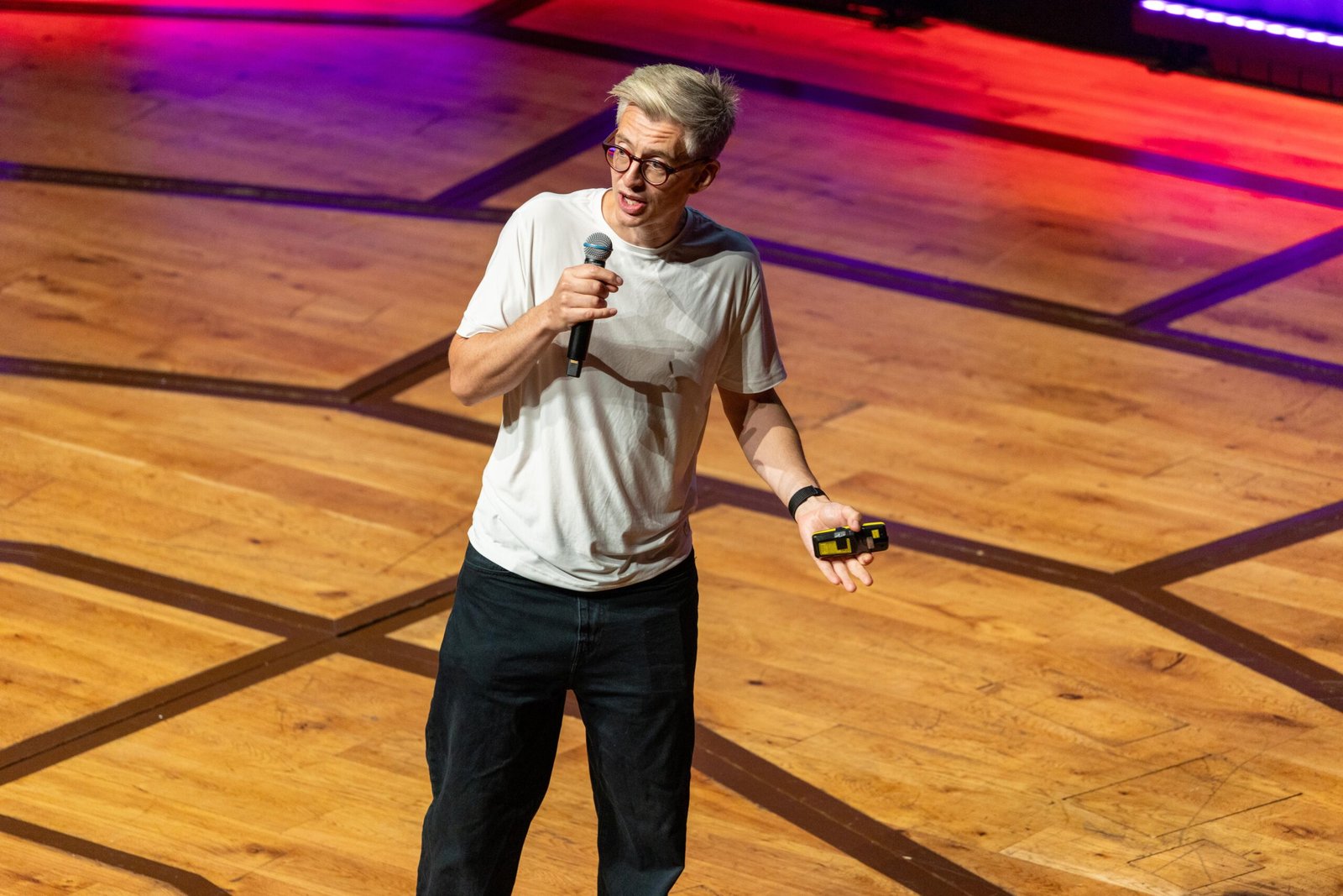 James Hoffmann gesturing while presenting slides at Bristol Coffee Festival
