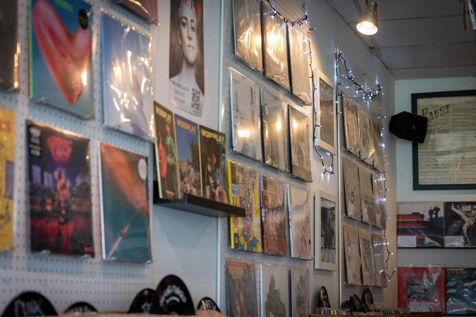 Shelves of vinyl records stretching along the interior walls