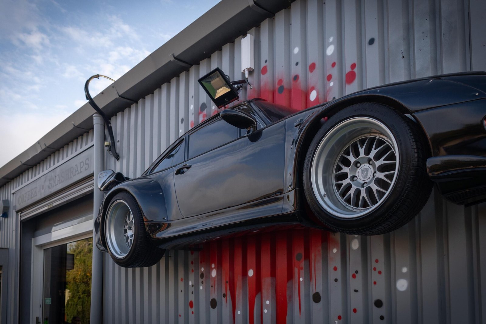 A half-car sculpture at Unit Vii, among the more unusual coffee stops in Watford