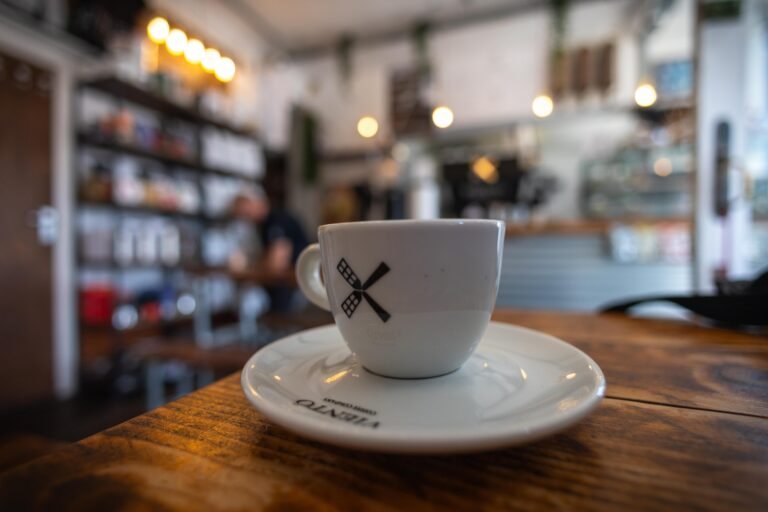 A branded Viento Coffee Company espresso cup with windmill logo, one of the coffee stops in Watford featured in this round-up