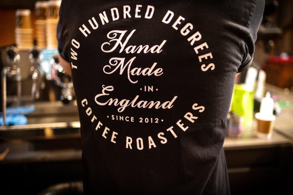 Back of a 200 Degrees Coffee Roasters T-shirt reading Hand Made in England, since 2012