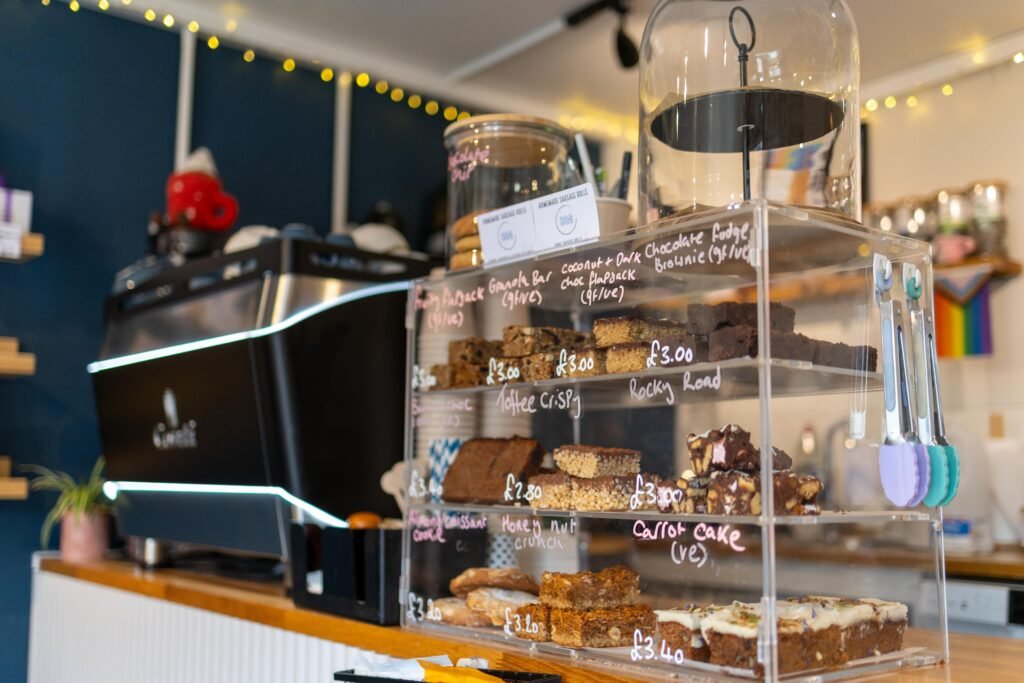 Espresso machine and cake display on the counter at Bean & Gone Coffee in Hertford