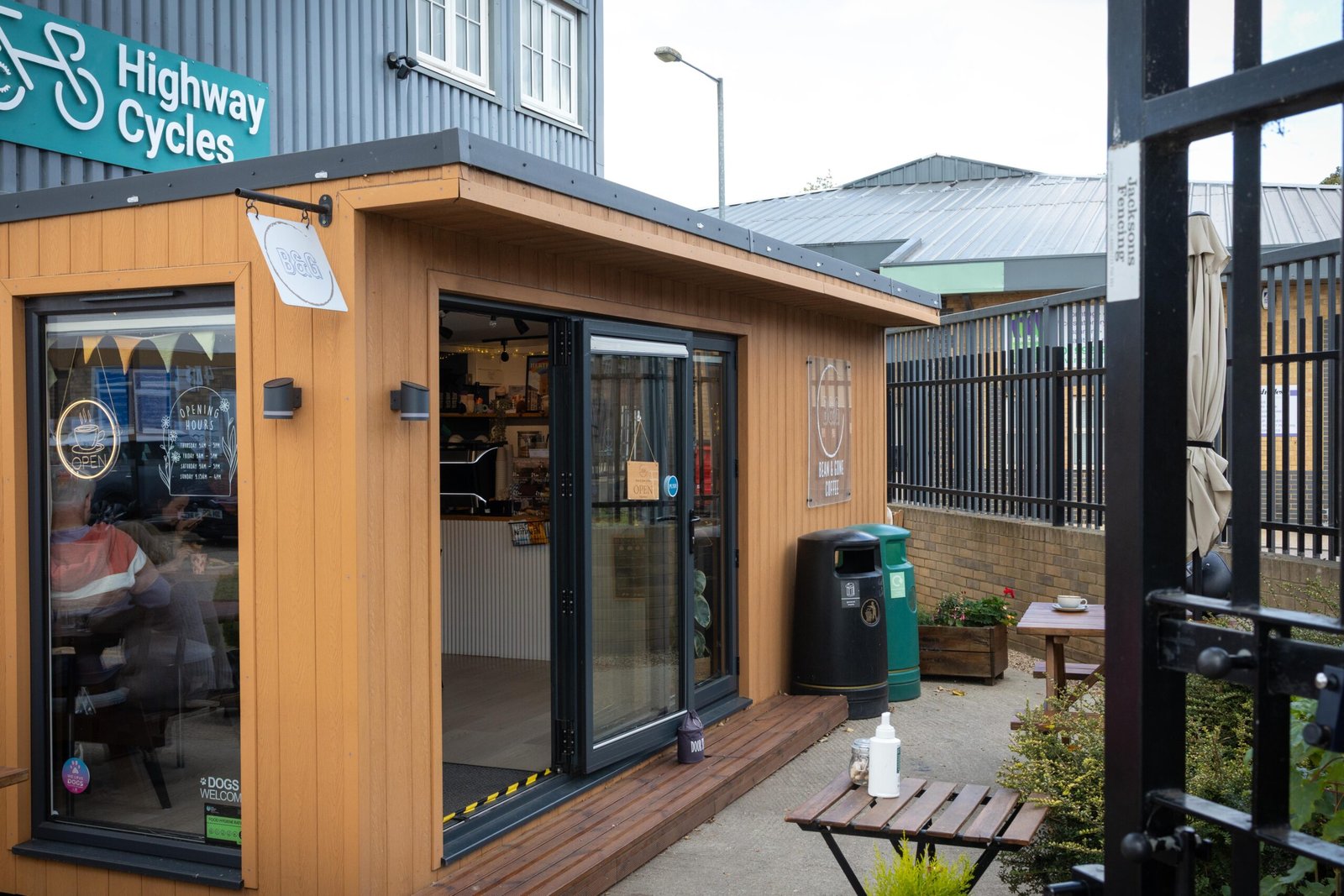 The wooden kiosk and picnic bench outside Bean & Gone Coffee, one of the friendliest coffee shops in Hertford