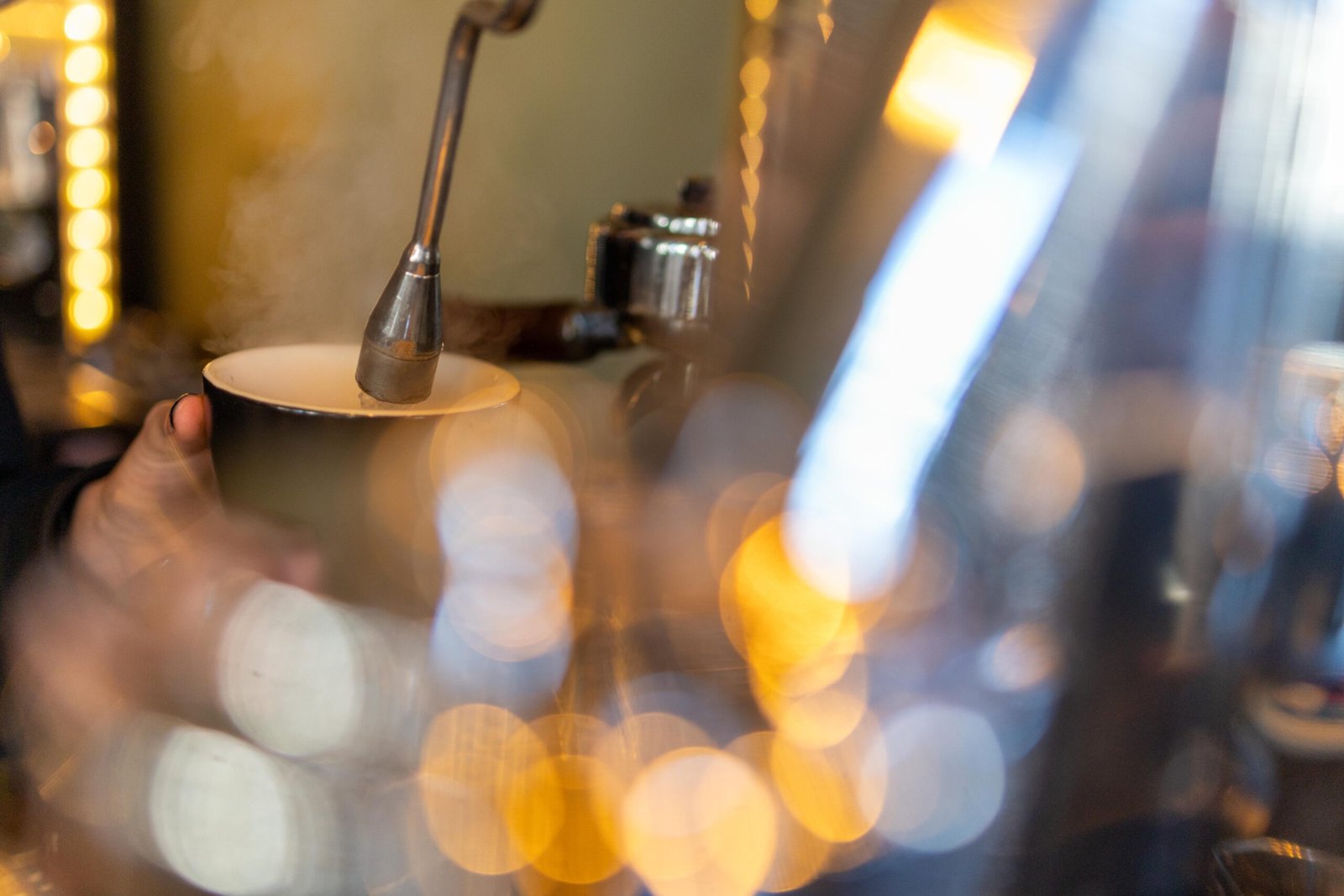 Espresso pouring into a cup at a coffee shop in Hertford