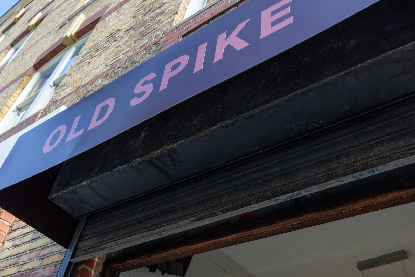 Old Spike signage above the cafe entrance