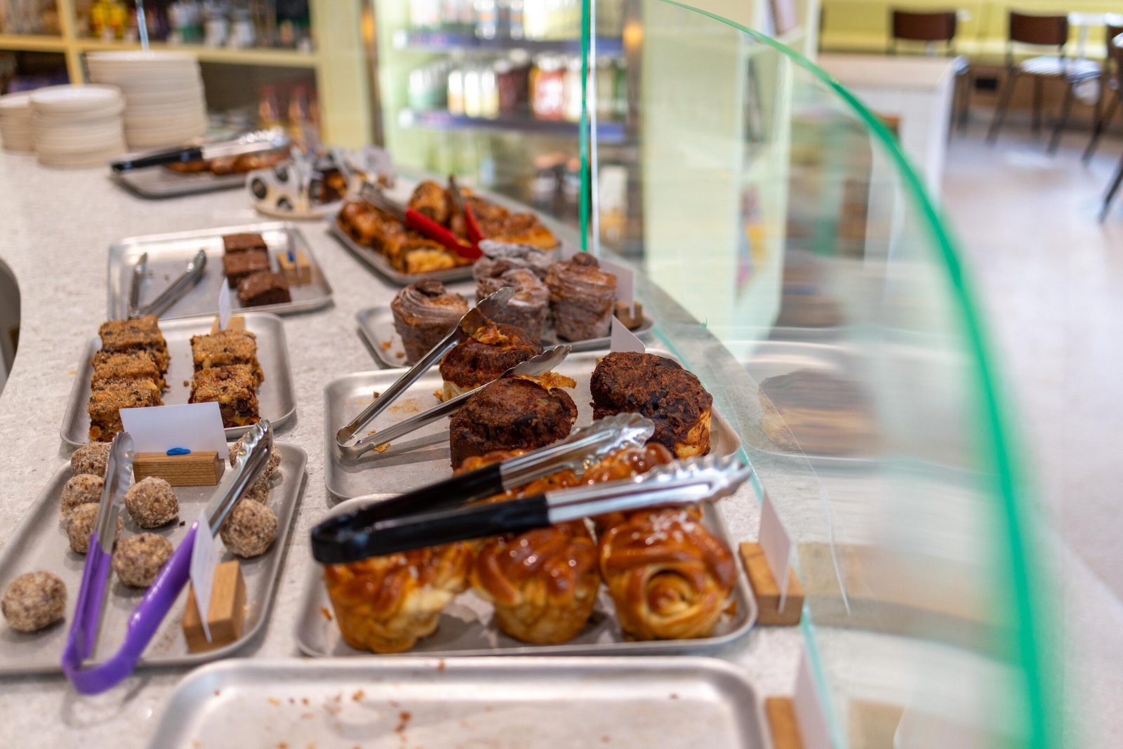 Pastries and baked goods in the display counter at Proto Artisan Bakery